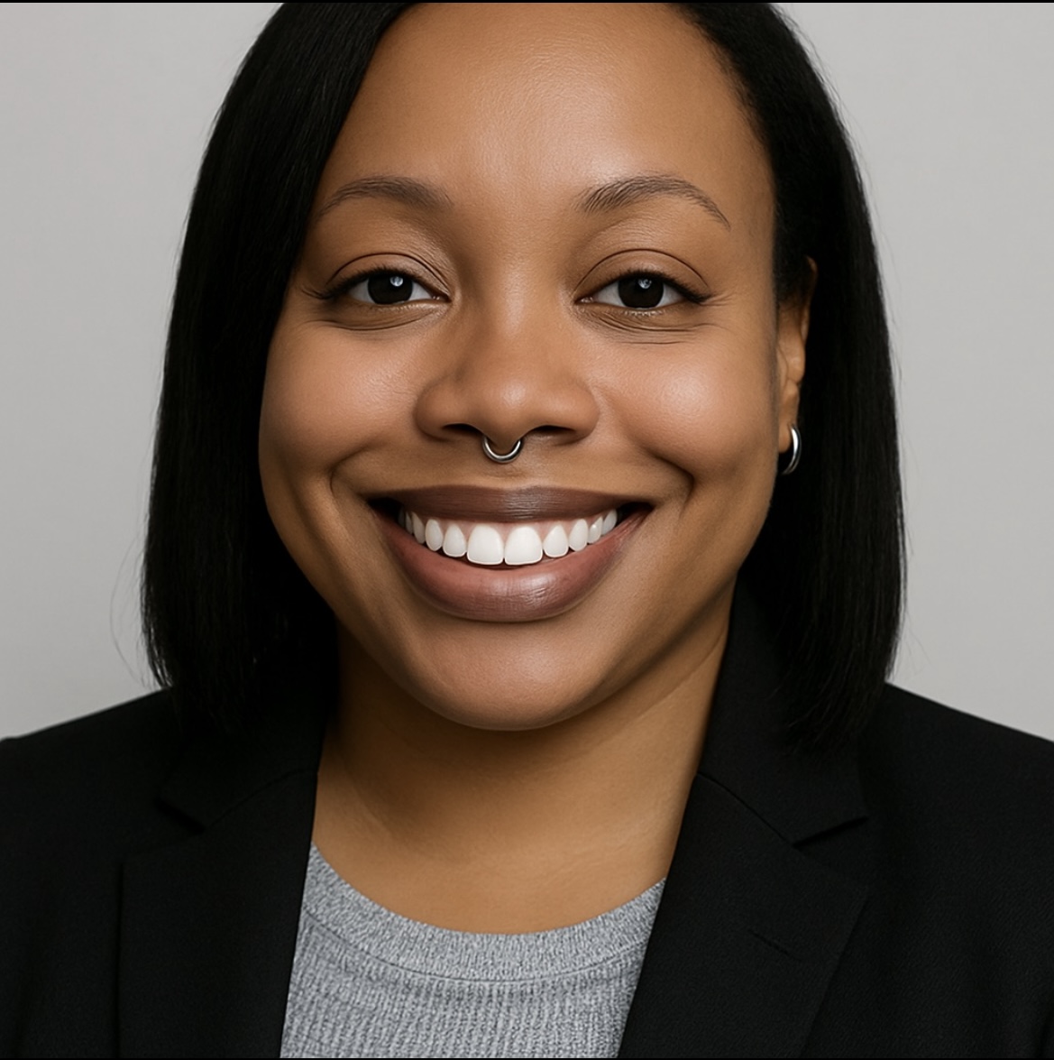 Ashleigh headshot in blazer.